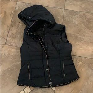 Black vest with brown trim